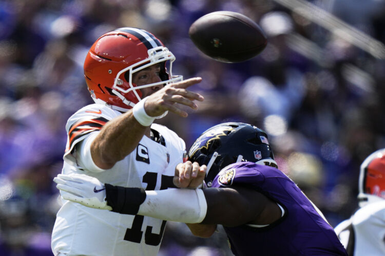 Jackson throws 4 TD passes as Baltimore dominates Cleveland